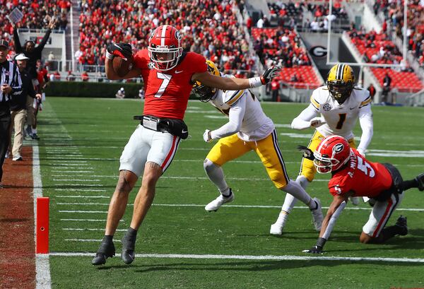 Georgia wide receiver Jermaine Burton gets into the end zone past Missouri defensive back Akayleb Evans for a touchdown to take a 33-3 lead during the third quarter in a NCAA college football game on Saturday, Nov. 6, 2021, in Athens.   “Curtis Compton / Curtis.Compton@ajc.com”