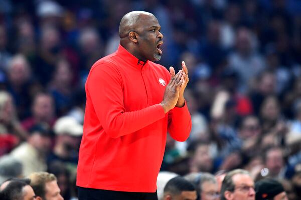 Atlanta Hawks coach Nate McMillan yells to players during the first half of the team's NBA play-in basketball game against the Cleveland Cavaliers on Friday, April 15, 2022, in Cleveland. (AP Photo/Nick Cammett)