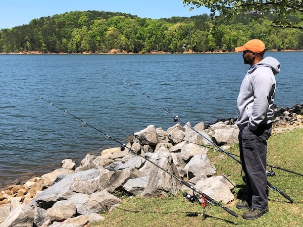 Acworth’s Jackie Scott awaits a call on any one of three lines at Lake Allatoona. (Steve Hummer/Staff)