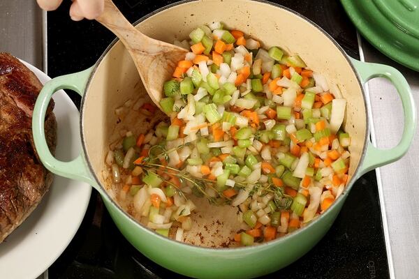 After removing the meat, saute the aromatic vegetables until lightly browned. (Michael Tercha/Chicago Tribune/TNS)