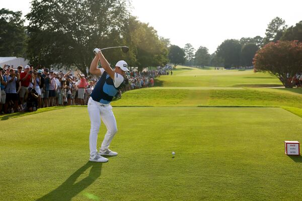 Viktor Hovland tees off on the 16th hole during the final round of the Tour Championship at East Lake Golf Club, Sunday, August 27, 2023, in Atlanta. (Jason Getz / Jason.Getz@ajc.com)