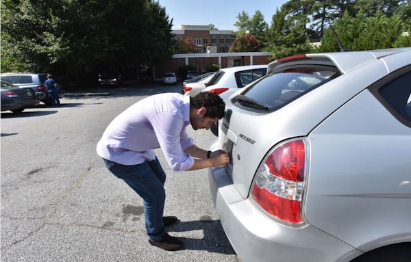 Georgians hoping to renew their car tags in May or June should know the service will be shut down for days at he end of this month. HYOSUB SHIN/HSHIN@AJC.COM