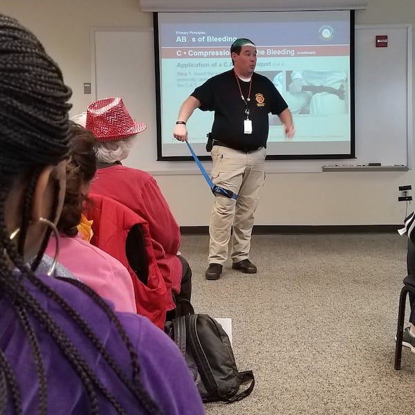 March 24, 2018: An instructor in the “Stop the Bleed” program teaches participants how to provide emergency First Aid at the DeKalb Fire and Rescue Administration. Photo: Jennifer Peebles/AJC