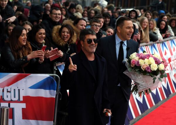  MANCHESTER, ENGLAND - FEBRUARY 09: Judges Simon Cowell (L) and David Walliams arrive for the Britain's Got Talent Manchester auditions on February 9, 2017 in Manchester, United Kingdom. (Photo by Nigel Roddis/Getty Images)