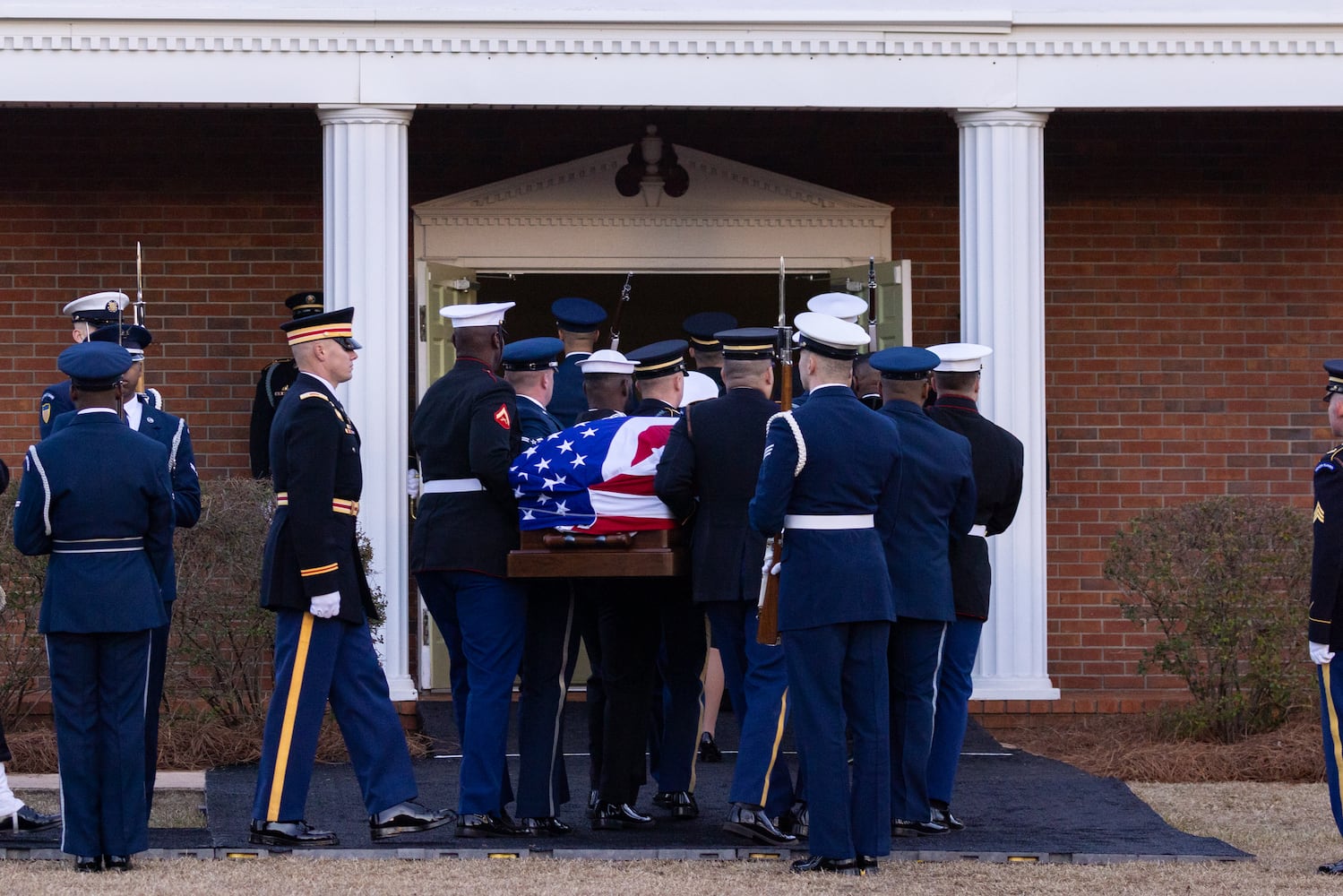 President Carter comes home to Plains for final funeral service
