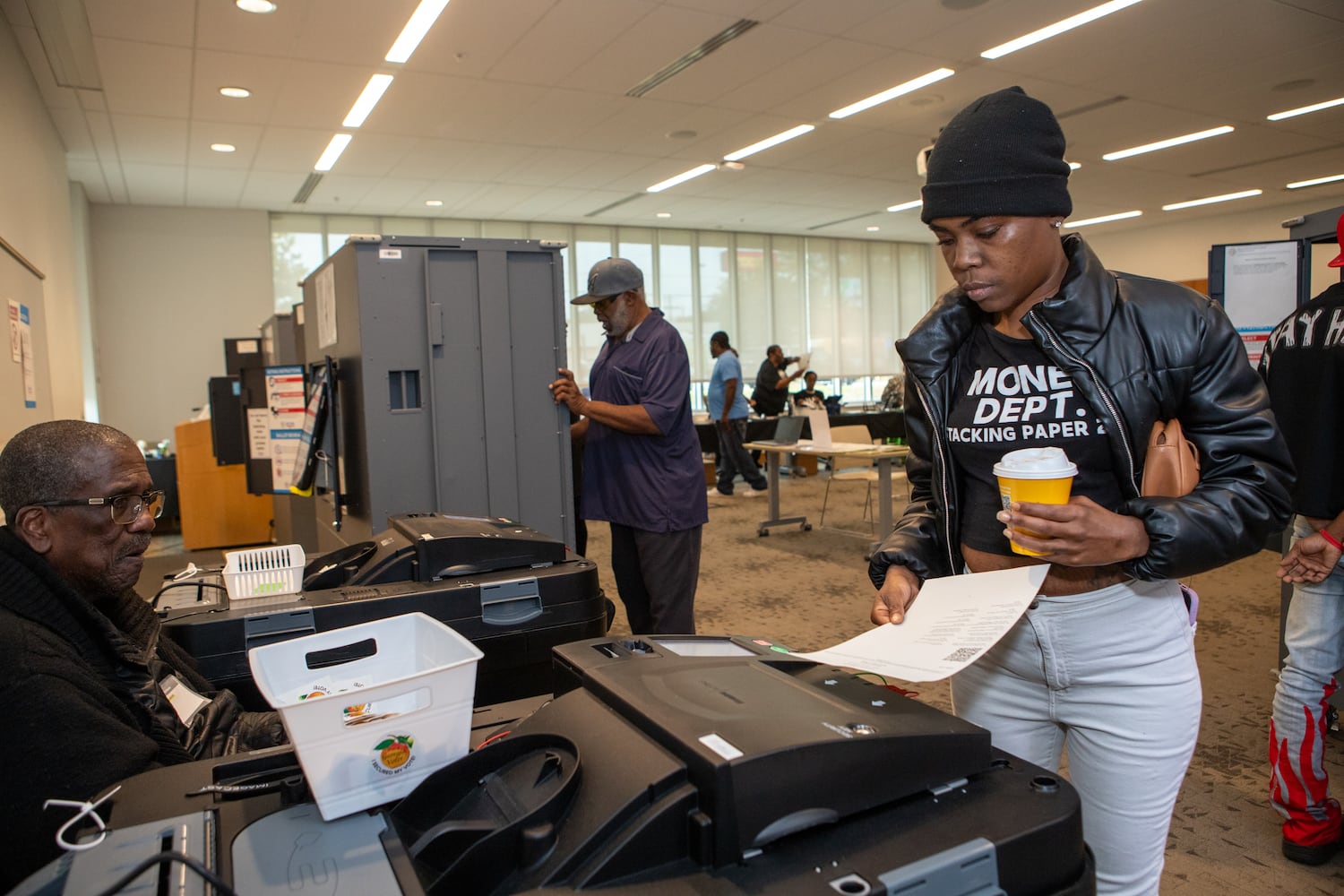 The last day of early voting in Georgia takes place at Metropolitan Library in South Fulton County where Victoria Henderson casts her vote Friday, November 1, 2024.  The polling location had a steady stream of voters throughout the day.  (Jenni Girtman for The Atlanta Journal-Constitution)