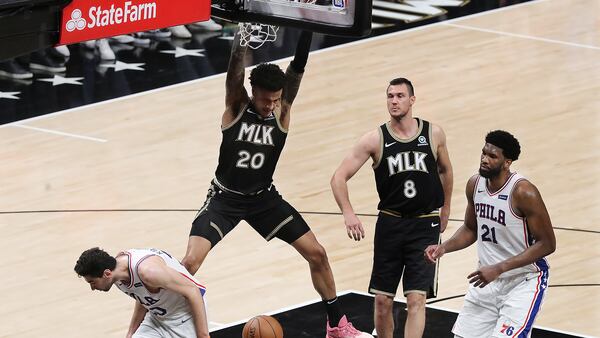 Big win for the Hawks: John Collins slams home one of several key baskets for the Hawks during their second-half comeback in Monday's 103-100 Game 4 victory over the 76ers at State Farm Arena. The win tied the best-of-seven series at two games apiece heading into Wednesday's Game 5 in Philadelphia.