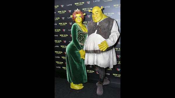 Heidi Klum and Tom Kaulitz show up dressed as Princess Fiona and Shrek to Klum's 19th Annual Halloween Party at Lavo on October 31, 2018 in New York City.