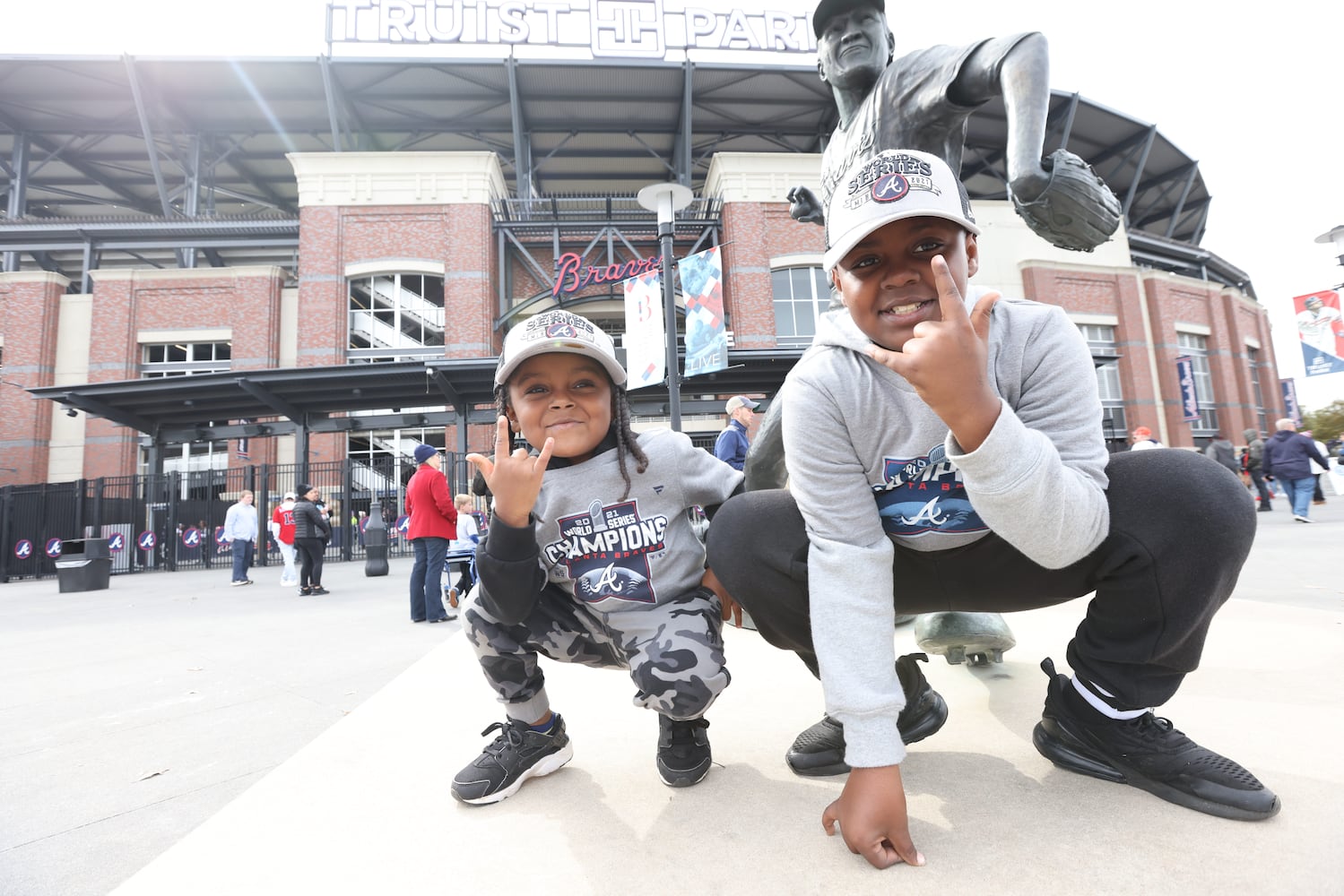 Karter and Kevin Andrews from Dekalb county poses outside of the Truist Stadion, ready to celebrate the Atlanta Braves the World Series 2021 on Friday, November 5, 2021.
Miguel Martinez for The Atlanta Journal-Constitution