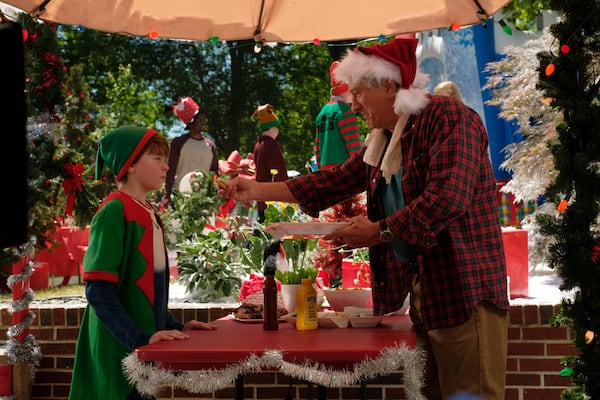 Oakes Fegley (left) with Robert DeNiro (right) in the film "War With Grandpa" out October 9, 2020 in theaters. This scene in Grant Park was shot in the spring of 2017. CR: Marro Films