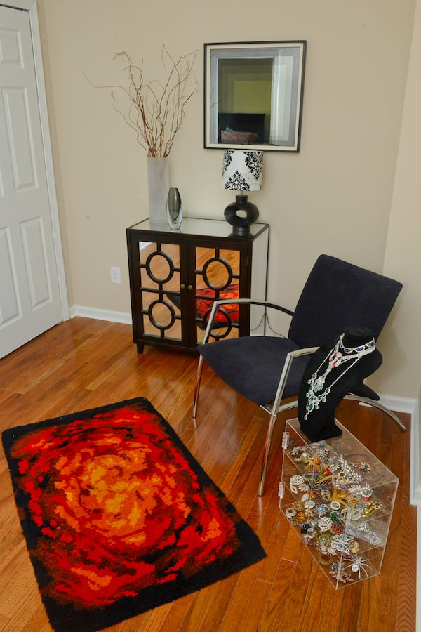 When homeowners Jeffrey Chandler and Pedro Ayestaran Diaz moved into their three-bedroom townhome, they replaced the carpet on the second and third floors with golden oak flooring, seen here in the foyer. Text by Lori Johnston and Keith Still/Fast Copy News Service. (Christopher Oquendo Photography/www.ophotography.com)