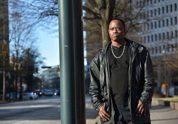 Mack Cook III, a graduate of the Fulton County drug court, recently got his dream job as a substance abuse counselor. (Hyosub Shin/AJC)