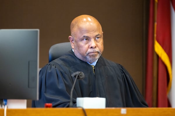 Judge Ural Glanville speaks to a juror during proceedings in the “Young Slime Life” gang trial in Atlanta on Monday, October 23, 2023. (Arvin Temkar / arvin.temkar@ajc.com)