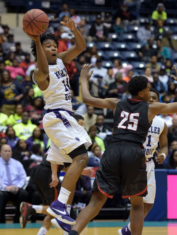 Miller Grove Wolverines play the Allatoona Buccaneers in the Class AAAAA boys championship at the Macon Coliseum Friday, March 4, 2016. The Wolverines beat the Buccaneers 50-48, for their 7th title in 8 years. KENT D. JOHNSON/ kdjohnson@ajc.com