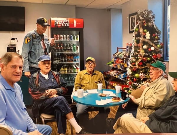 Robert Blan (center) sits with his fellow coffee club members in Sherwood's Drug Shop in Buford, GA.
(Courtesy of Robin and Vinci Blan)