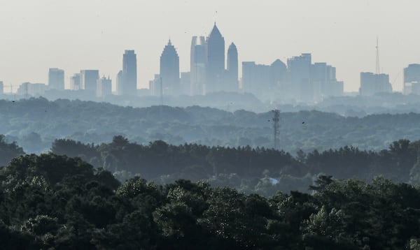 The Atlanta skyline is enveloped in haze on Thursday, June 16, 2022. (AJC file)