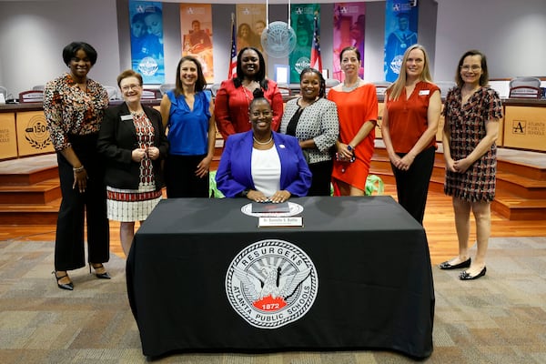 The newly elected interim Atlanta Public Schools Superintendent, Danielle Battle, poses with the  APS Board Members on Monday, August 28, 2023.
Miguel Martinez /miguel.martinezjimenez@ajc.com