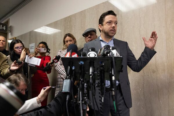 Timothy Oliver Lee, the brother of Bob Lee, makes remarks at the Hall of Justice during the murder trial of Nima Momeni Tuesday, Dec. 17, 2024, in San Francisco. (AP Photo/Benjamin Fanjoy)