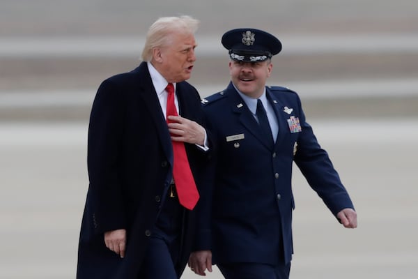 President Donald Trump recently spoke with Col. Paul Pawluk before boarding Air Force One at Joint Base Andrews in Maryland.