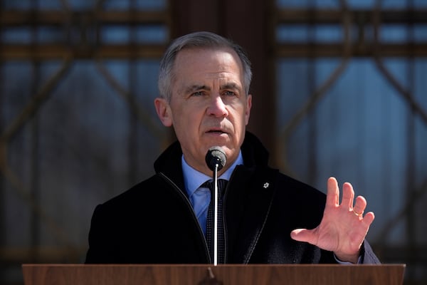 Canada Prime Minister Mark Carney speaks to media at Rideau Hall, where he asked the Governor General to dissolve Parliament and call an election, in Ottawa, Sunday, March 23, 2025. (Adrian Wyld/The Canadian Press via AP)