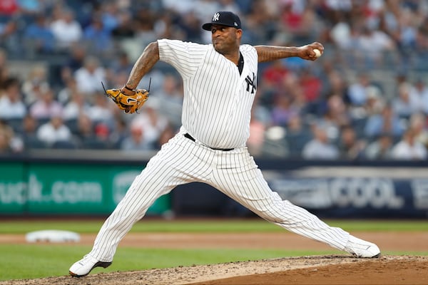 FILE - New York Yankees starting pitcher CC Sabathia throws during the fourth inning of the team's baseball game against the Tampa Bay Rays, July 16, 2019, in New York. (AP Photo/Kathy Willens, file)