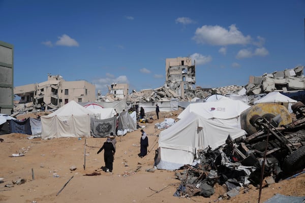 Displaced Palestinians set up tents next to the Indonesian Hospital in northern Gaza, a day after Israel's renewed offensive, Wednesday, March 19, 2025. (AP Photo/Jehad Alshrafi)