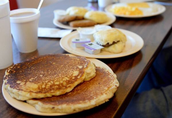 Among the breakfast dishes available at Johhny V's in Macon are pancakes and sausage biscuits. (Courtesy of Jenna Eason/The Telegraph)