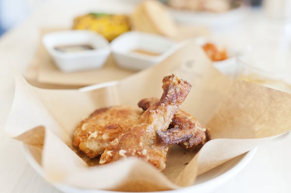 Part of the secret to Umami Fried Chicken is marinating it overnight. Reprinted with permission from “The Peached Tortilla” © 2019 Eric Silverstein. Published by Sterling Epicure. CONTRIBUTED BY CARLI RENE / INKED FINGERS