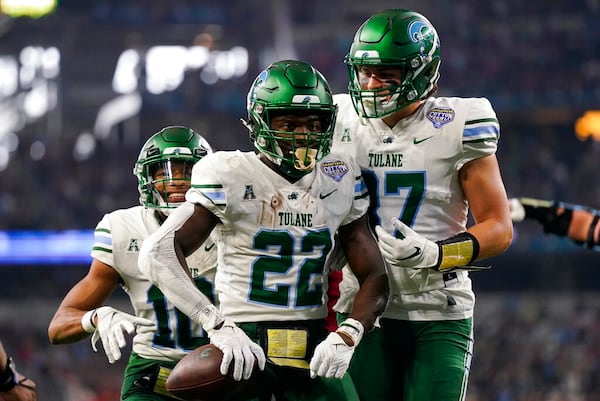 Tulane running back Tyjae Spears (22) has been spectacular during the first two days of practice at the Senior Bowl and has produced multiple big runs. (AP file photo/Sam Hodde)