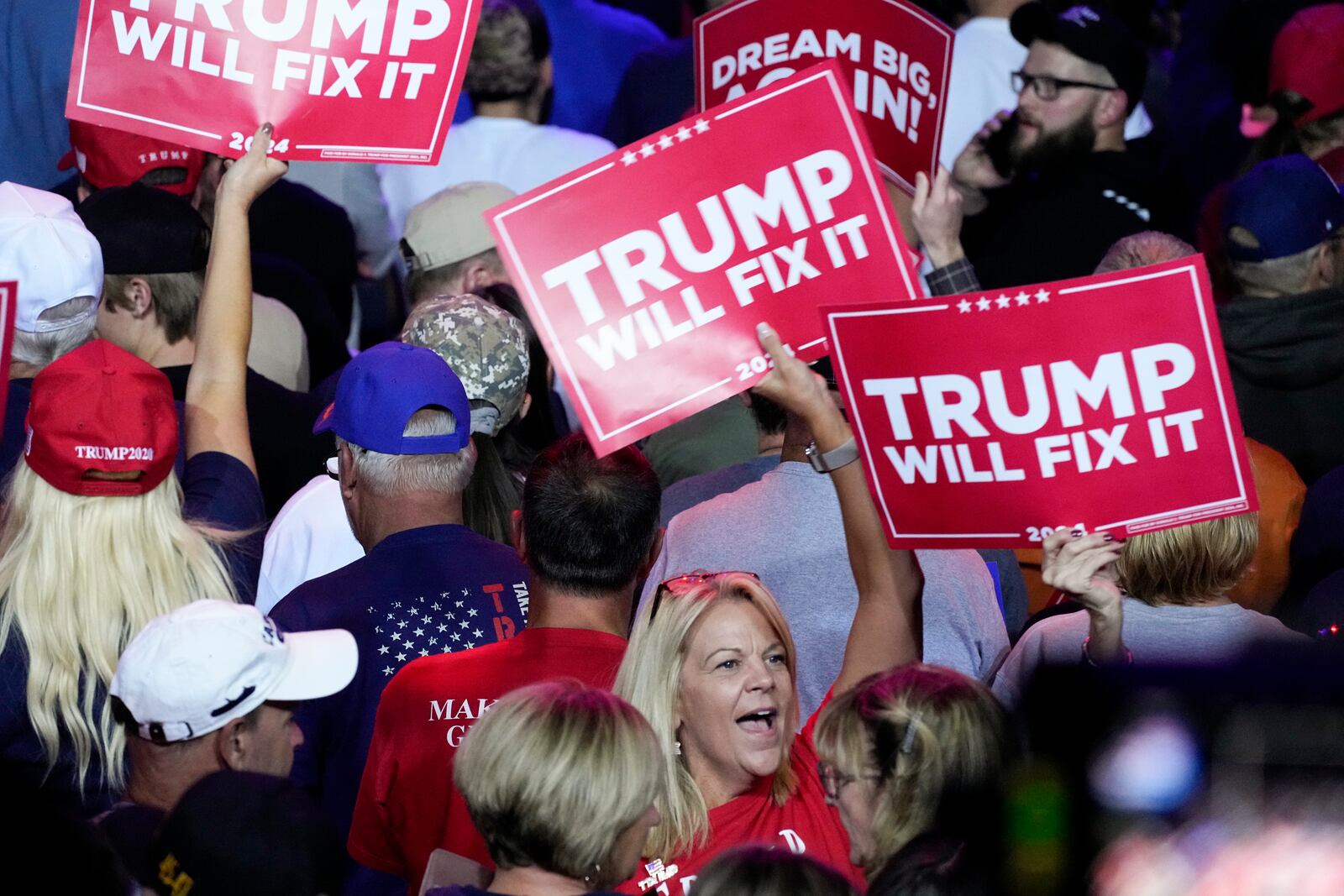 Supporters rally before Republican presidential nominee former President Donald Trump arrives for a rally in Salem Va., Saturday Nov 2, 2024. (AP Photo/Steve Helber)