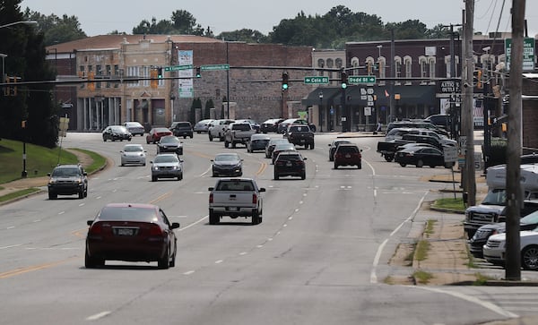 Motorist make thier way through downtown Fairburn on Monday, August 12, 2019, in Fairburn. CURTIS COMPTON/CCOMPTON@AJC.COM