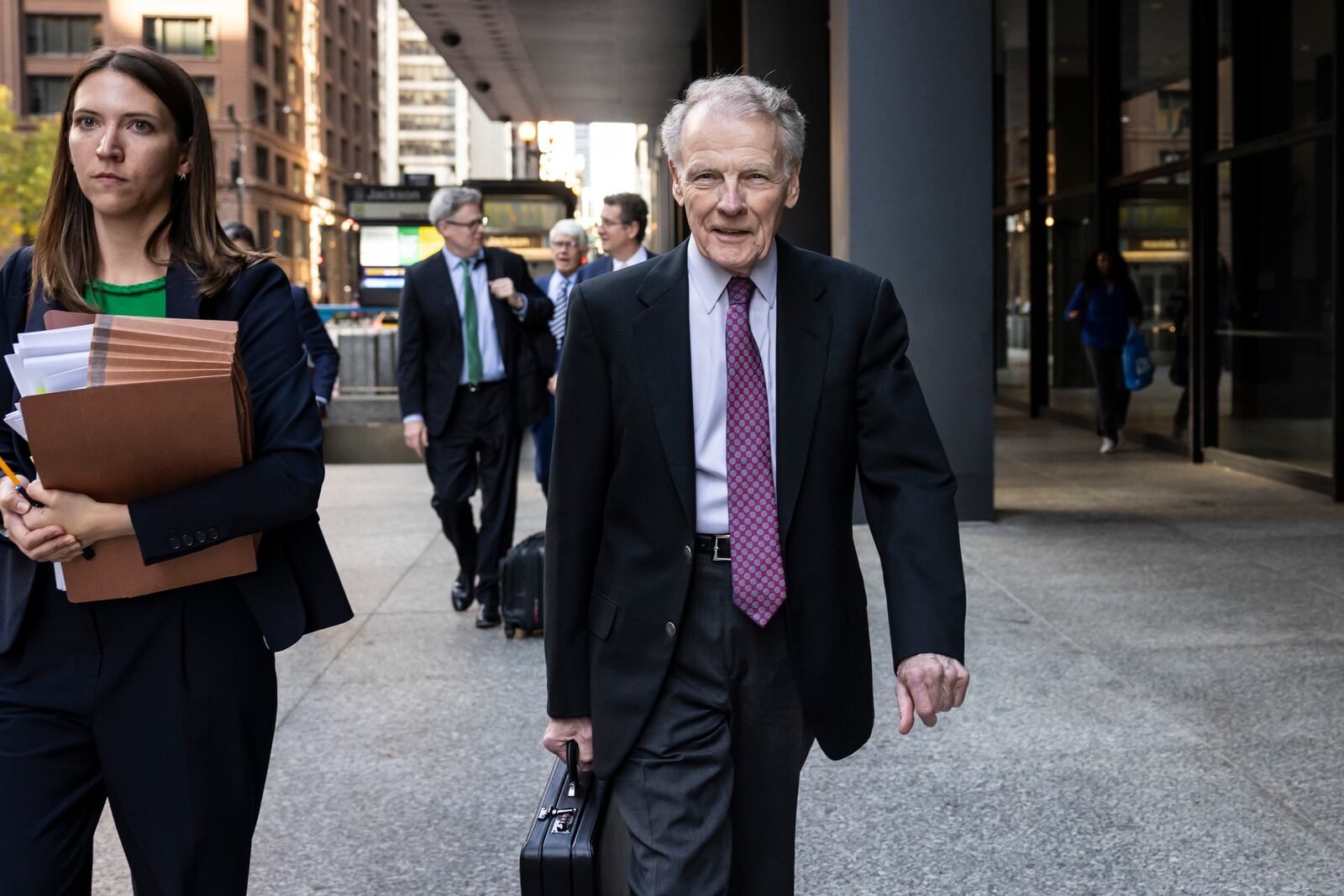 Illinois' former House Speaker Michael Madigan, charged in a multimillion-dollar racketeering and bribery scheme that included the state’s largest utility, ComEd, walks out of the Dirksen Federal Courthouse, Wednesday, Oct. 9, 2024 in Chicago. (Ashlee Rezin/Chicago Sun-Times via AP)