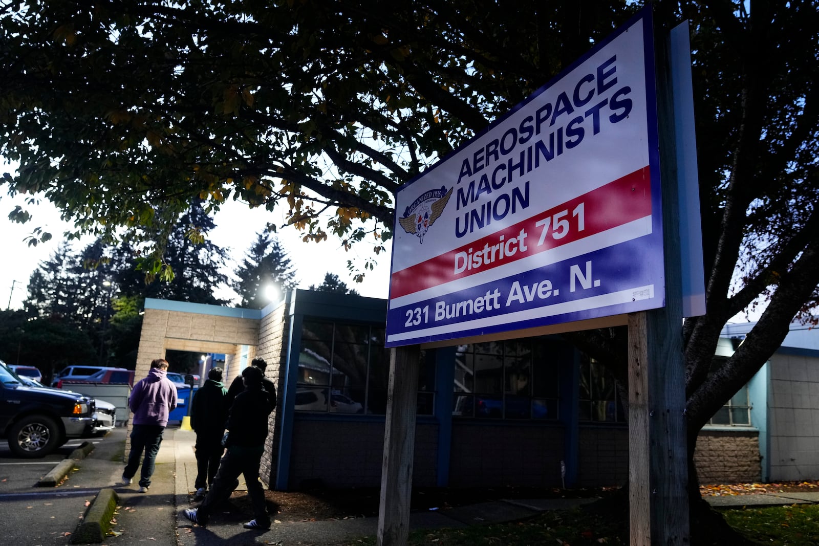 Boeing employees arrive to vote on a new contract offer from the company Monday, Nov. 4, 2024, at the Aerospace Machinists Union hall in Renton, Wash. (AP Photo/Lindsey Wasson)