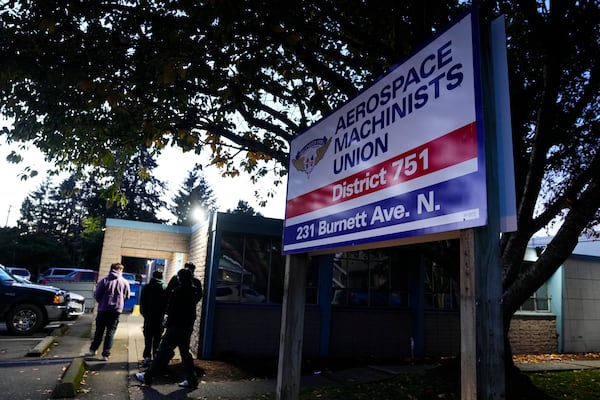 Boeing employees arrive to vote on a new contract offer from the company Monday, Nov. 4, 2024, at the Aerospace Machinists Union hall in Renton, Wash. (AP Photo/Lindsey Wasson)