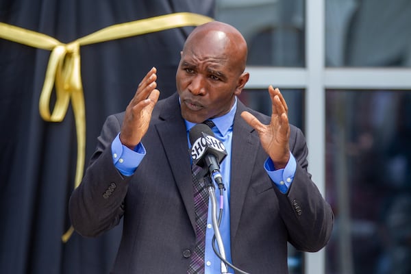 Legendary boxer Evander Holyfield talks to the crowd before the unveiling of a bronze statue in his likeness at State Farm Arena this Friday, June 25.STEVE SCHAEFER FOR THE ATLANTA JOURNAL-CONSTITUTION