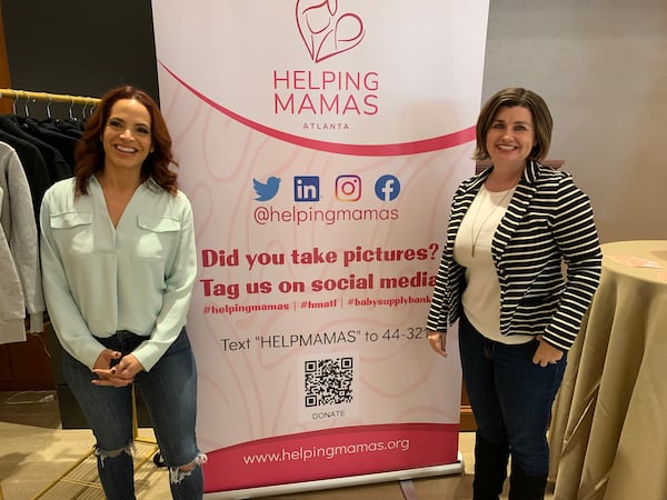 At the Omni Hotel on Thursday, December 15, 2022, Elle Duncan supports Helping Mamas, which raises money to provide diapers for women in need. She is here with Stephanie Ungashick, Helping Mamas Director of Advancement. RODNEY HO/rho@ajc.com