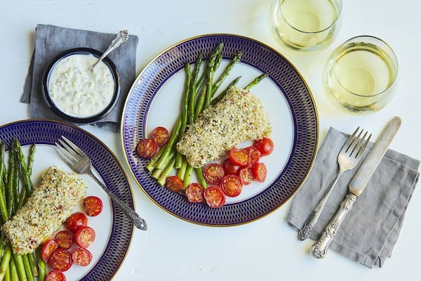 Panko-crusted Fish Fillet with Spicy Remoulade with Oven-roasted Asparagus and Grape Tomatoes is an easy and flavorful meal in one that works with any fish fillet, fresh or frozen. CONTRIBUTED BY VIRGINIA WILLIS