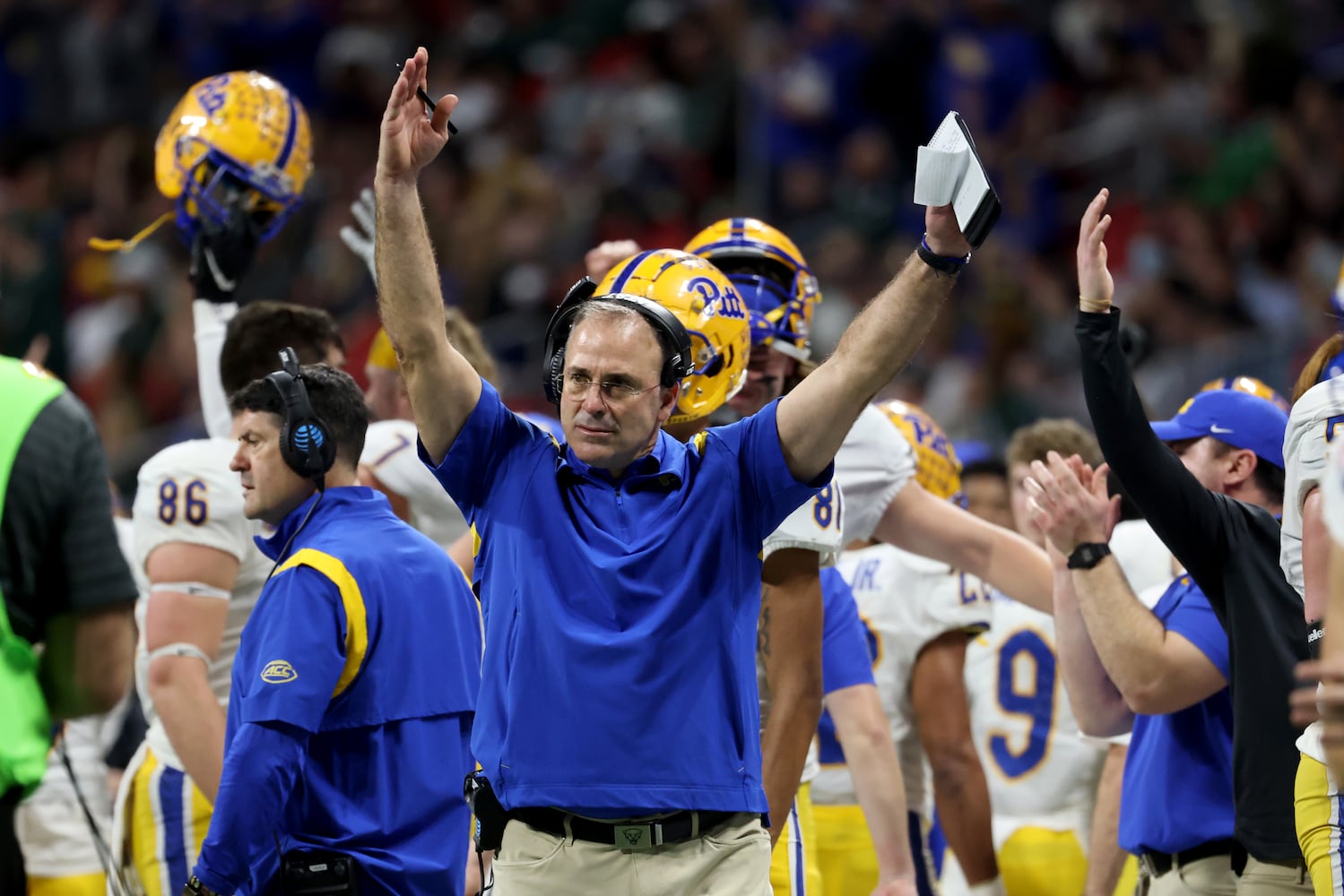 Pittsburgh Panthers head coach Pat Narduzzi reacts after a receiving touchdown is confirmed by officials during the first half against the Michigan State Spartans in the Chick-fil-A Peach Bowl at Mercedes-Benz Stadium in Atlanta, Thursday, December 30, 2021. JASON GETZ FOR THE ATLANTA JOURNAL-CONSTITUTION