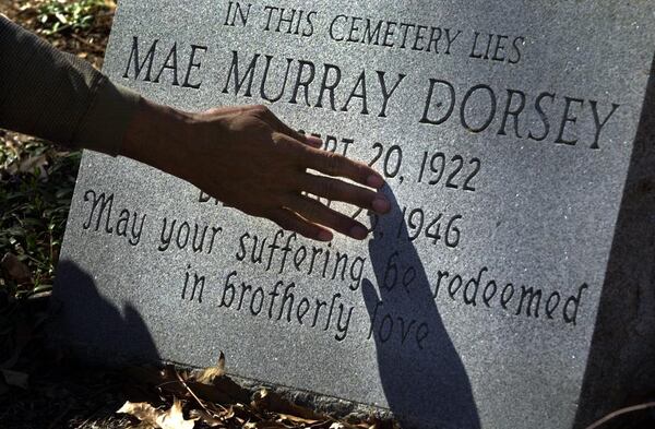 A memorial tombstone for Mae Murray Dorsey, one of four African American victims slain in the 1946 Moore’s Ford lynching, is at Zion Hill Cemetery in Monroe, Ga. (CURTIS COMPTON / STAFF)