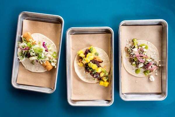 Street Taco Baja Fish Taco on Flour (left) Al Pastor on Corn (middle) and Smoked Brisket on Flour (right). Photo credit- Mia Yakel.