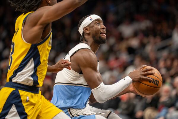 Atlanta Hawks guard Caris LeVert (3) moves the ball during the second half of an NBA basketball game between the Indiana Pacers, Saturday, Mar. 8, 2025, in Atlanta. (AP Photo/Erik Rank)