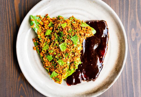 Barbecued beef belly with watermelon hoisin and peanuts at Cold Beer. CONTRIBUTED BY HENRI HOLLIS