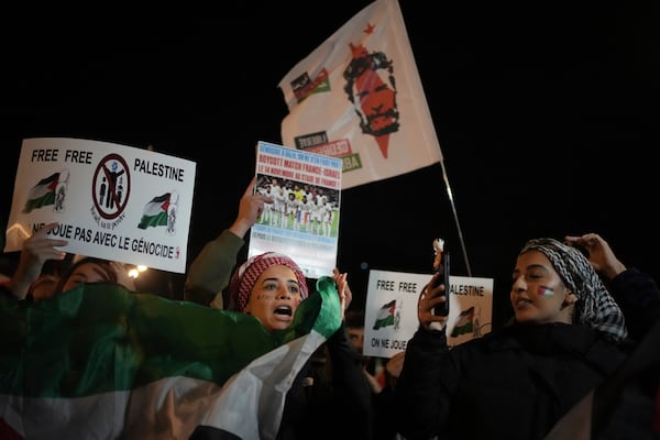 Demonstrators attend a rally in support of the Palestinian people, ahead of the Nations League soccer match France against Israel, Thursday, Nov. 14, 2024 in Saint-Denis, outside Paris. (AP Photo/Christophe Ena)