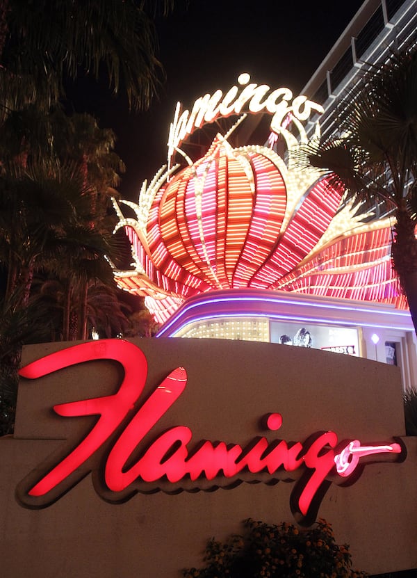 LAS VEGAS, NV - SEPTEMBER 9: The Flamingo Las Vegas sign is illimunated at night on September 9, 2012 in Las Vegas, Nevada. According to reports, an AFL player of Port Adelaide died after falling from a balcany at the hotel. (Photo by Isaac Brekken/Getty Images) Getty Images