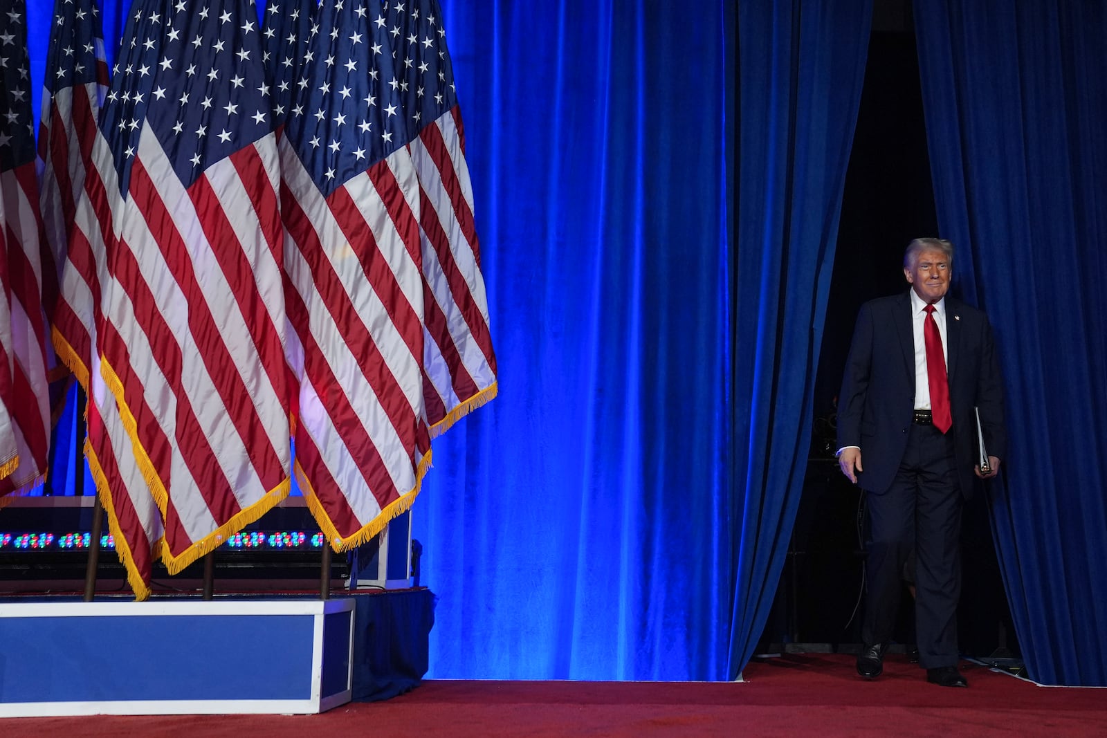 Republican presidential nominee former President Donald Trump arrives at an election night watch party at the Palm Beach Convention Center, Wednesday, Nov. 6, 2024, in West Palm Beach, Fla. (AP Photo/Evan Vucci)