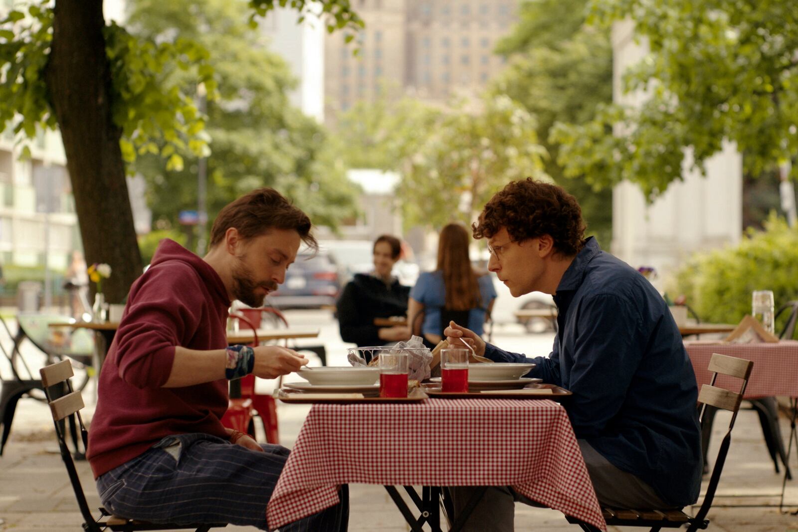 This image released by Searchlight Pictures shows Kieran Culkin, left, and Jesse Eisenberg in a scene from "A Real Pain." (Searchlight Pictures via AP)