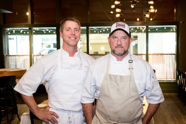 Chef/owners Lance Gummere and Shaun Doty (left to right) in the dining room at he Federal. Photo credit- Mia Yakel.