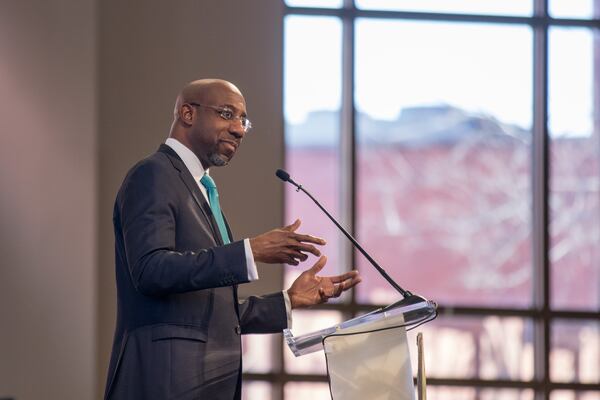 The Rev. Raphael Warnock speaks during the Martin Luther King Jr. annual commemorative service at Ebenezer Baptist Church in Atlanta on Jan. 20, 2020. BRANDEN CAMP/SPECIAL