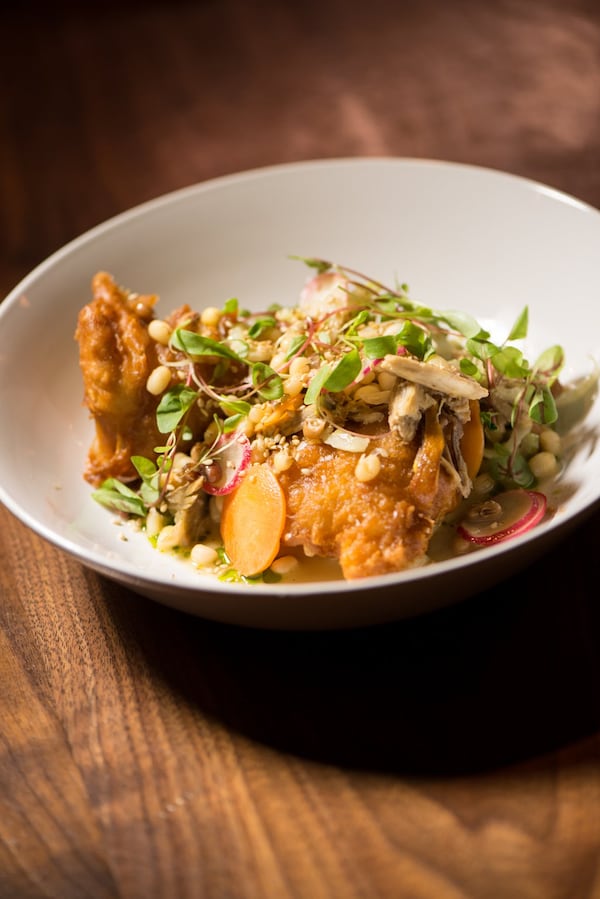 Fry Bread with Braised Meat, Peas, and Shaved Root Vegetables. CONTRIBUTED BY MIA YAKEL