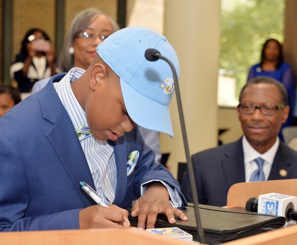 Elijah Precciely, 11, signed an academic letter of intent to attend Southern University. (Photo: John Oubre/Southern University)